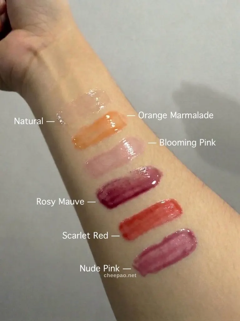 Swatch สีลิปบาล์ม INGU Nio-Glow ทั้ง 6 เฉดบนข้อมือ Natural, Orange Marmalade, Blooming Pink, Rosy Mauve, Scarlet Red และ Nude Pink
